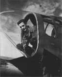 SSgt. William Gradischer cleans the glass observation post of the P-61 radar observer