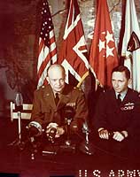 Photo # USA C-2342:  General of the Army Eisenhower and Air Chief Marshall Tedder address the World, after Germany's surrender, 7 May 1945