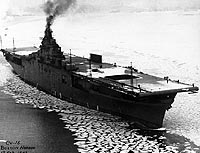 Photo #  80-G-35657:  USS Lexington steams through ice in Boston Harbor, 17 February 1943