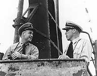Photo # 80-G-35725: Lt. R.H. O'Kane and LCdr. D.W. Morton on board USS Wahoo, February 1943
