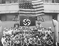 80-G-464023:  Crewmembers of USS Omaha (CL-4) on board the captured German ship Odenwald, November 1941
