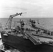Photo # 80-G-470115: Curtiss SOCs on the catapults of a light cruiser in the south Pacific area, January 1943