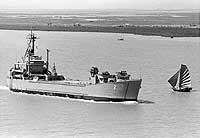 Photo # USN 711573:  USS Washtenaw County cruises in Haiphong Harbor, North Vietnam, at the end of Operation End Sweep, 1973