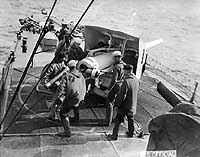 Photo # NH 41705:  USS Little gun crew practicing with her forward four-inch gun, October 1918
