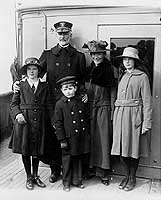 Photo # NH 45063:  Admiral William S. Sims with his family on board USS Aramis, 7 April 1919