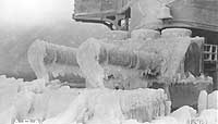 Photo # NH 50357:  Ice coats USS Frederick's forward eight-inch guns, forecastle and superstructure after operations at sea, circa 1917.