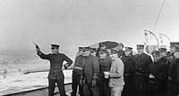 Photo # NH 51076:  Officers at revolver practice on board USS Kroonland, January 1919