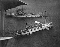 Photo # NH 53241:  USS Henderson returning a gun salute in the early 1920s, while flying the flag of Secretary of the Navy Denby.