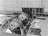 Photo # NH 53508:  Installing gyro stabilizing units in USS Henderson, at the Philadelphia Navy Yard, April 1917.
