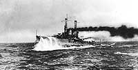 Photo # NH 63650:  USS Utah taking green water over the bow, December 1913