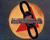 Photo # NH 71523-KN:  Insignia of USS Rochester, as used in the later 1950s and early 1960s