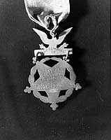 Photo # NH 82603: U.S. Army pattern Medal of Honor awarded to Gunnery Sergeant Fred W. Stockham, USMC, 1918