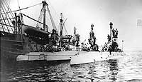 Photo # NH 85090:  USS C-2 (ex-Stingray) with other submarines alongside USS Severn, circa 1913