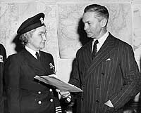 Photo # NH 97170: Nurse Corps Captain Sue Dauser receives the Distinguished Service Medal, Dec. 1945