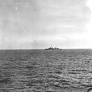 Photo # NH 97945:  HMAS Hobart steaming in the Coral Sea on 20 July 1943, shortly before she was torpedoed