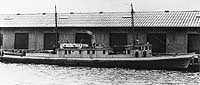 Photo # NH 100108:  USS Bayocean alongside a West Coast pier, circa 1918