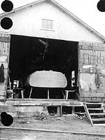Photo #  NH 101430:  Motor boat Dauntless in a boat house