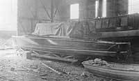 Photo #  NH 102363:  Motor boat Vitesse in a boat house, circa 1917