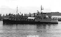 Photo # NH 103141:  YOG-56 underway in harbor, circa the 1950s