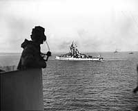 Photo # NH 104834:  USS Nevada painted in Camouflage Measure 31a Design 6B, circa March-May 1945.