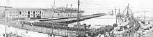 Photo # NH 106366:  USS Huron debarking troops at Newport News, Virginia on 11 July 1919.  Photographed by Moore