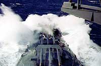 Photo # 80-G-K-3345: USS South Dakota steams into heavy seas, Feb. 1945