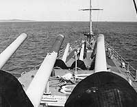 Photo # USN 1113596:  Six-inch guns on USS Galveston, off Vietnam, Sept. 1965.  Photographed by Cdr. J.I. Moore