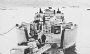 Hospital Corpsmen serve on all types of landing craft. This is an LCT 
with supplies at Attu.