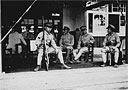 Plate 12--2. Young Men of High School Age in Drill Uniform at a School Celebration