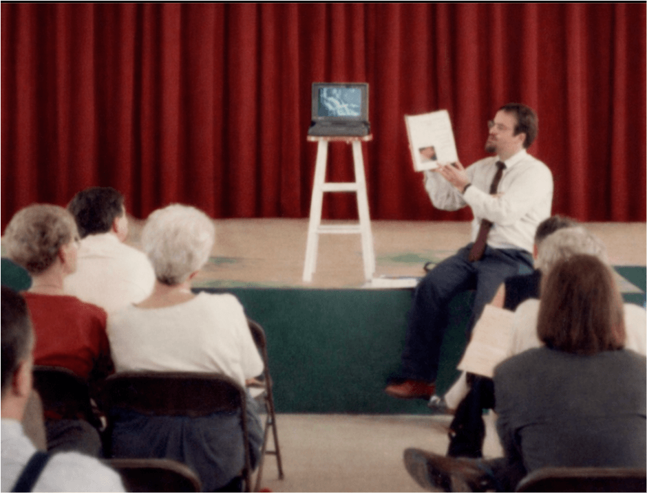 Image of presenter at a Walker Percy discussion meeting