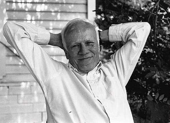 A Walker Percy Casual Portrait with Arms over His Head